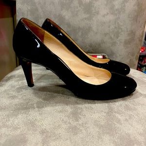 Authentic Prada black patent leather pumps